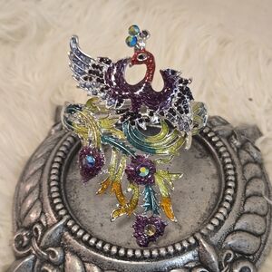 Elegant Silver and Purple Peacock Bracelet